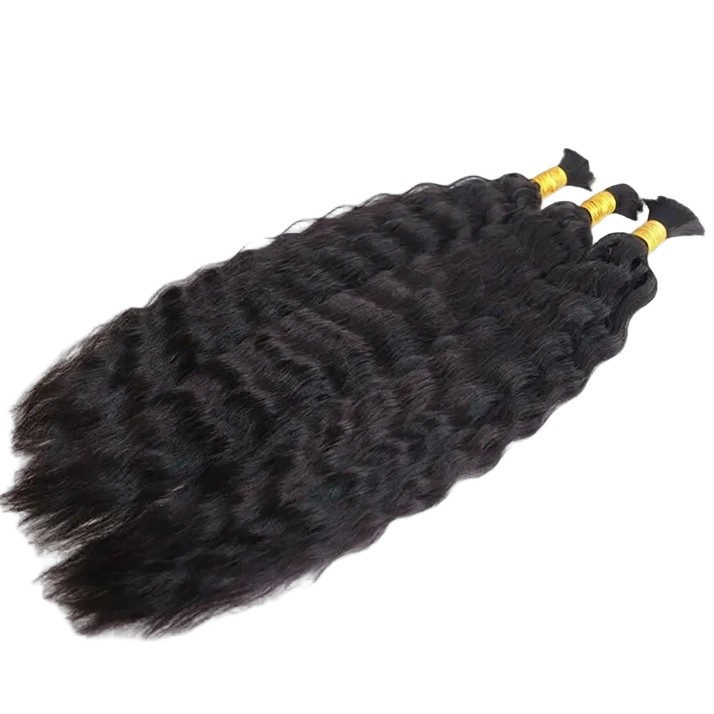 Black curly hair extensions with yellow ties on a white background